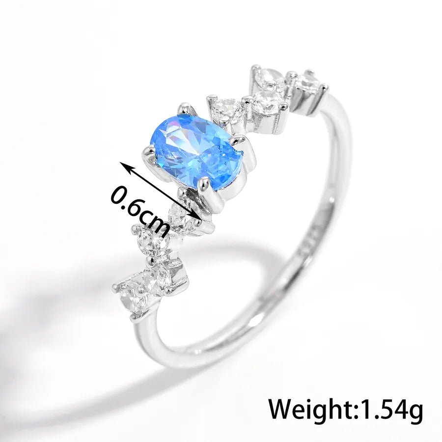 Azure Cœur™ Platinum - Plated Blue Zircon Heart Ring - Nikoleit