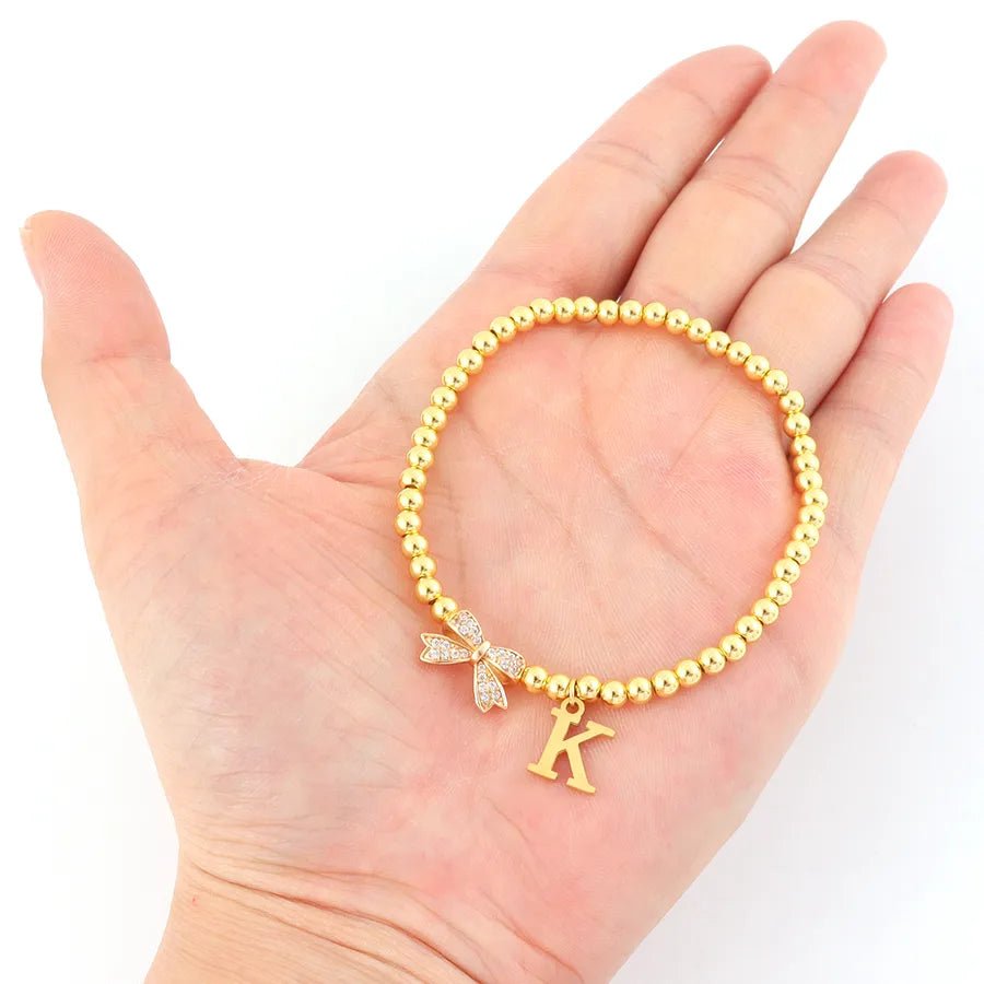 Vacuum Plating 18K Real Gold Plated Letter Bow Knot 201 Stainless Steel Copper Vintage Style Sweet Simple Style Slip - on Bracelets - Nikoleit