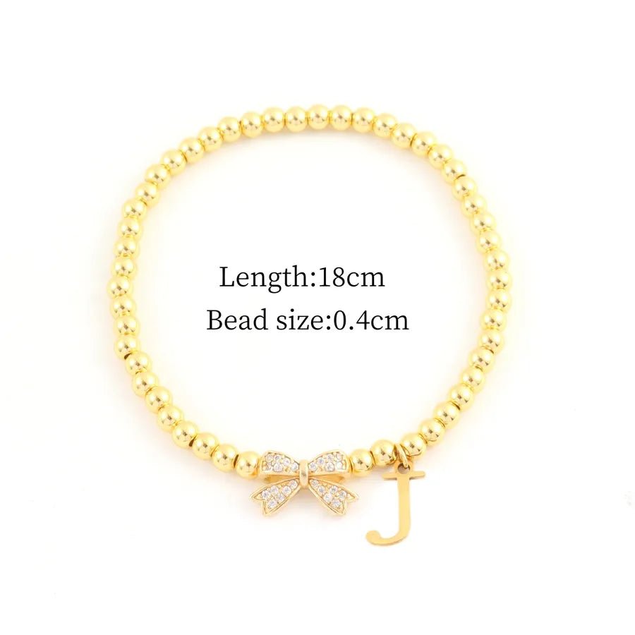 Vacuum Plating 18K Real Gold Plated Letter Bow Knot 201 Stainless Steel Copper Vintage Style Sweet Simple Style Slip - on Bracelets - Nikoleit