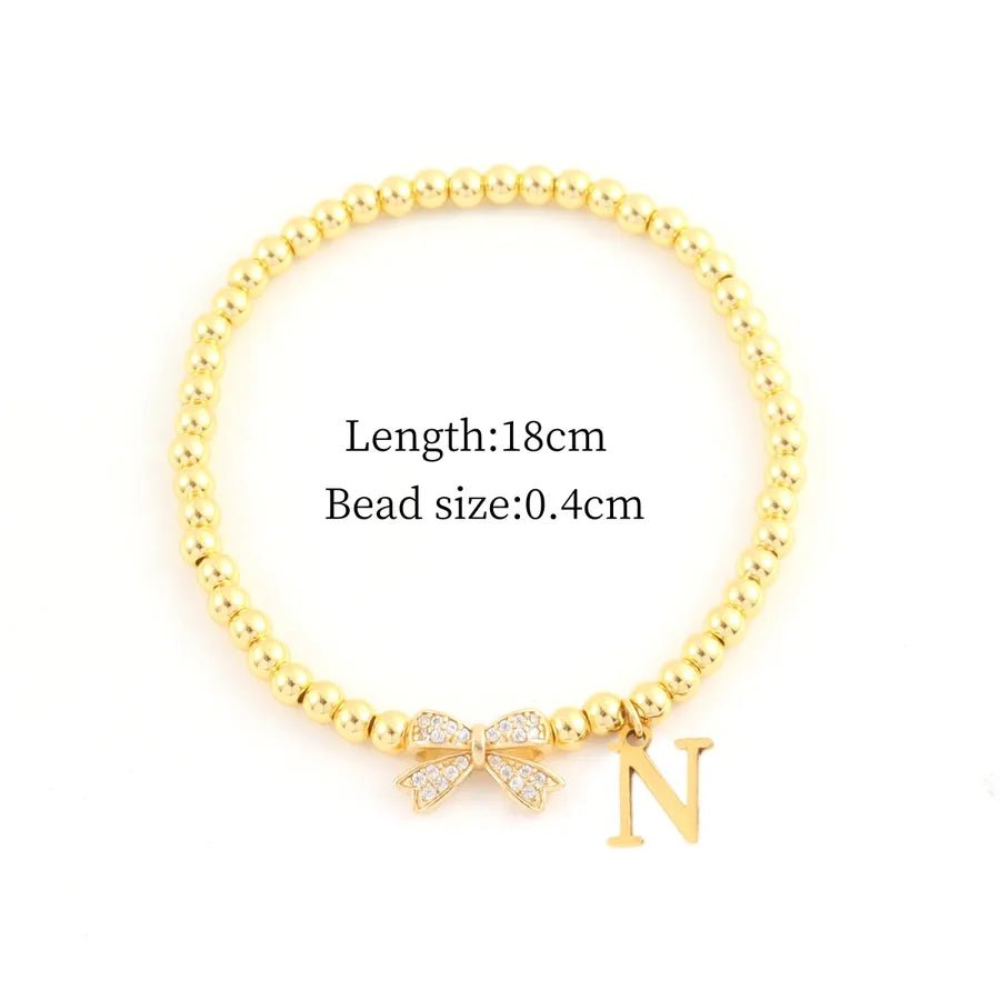 Vacuum Plating 18K Real Gold Plated Letter Bow Knot 201 Stainless Steel Copper Vintage Style Sweet Simple Style Slip - on Bracelets - Nikoleit